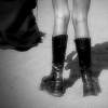 Knock-kneed In Killer Black Boots